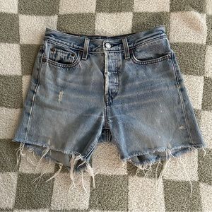 Custom, Levi’s distressed wedgie shirts. Premium denim!